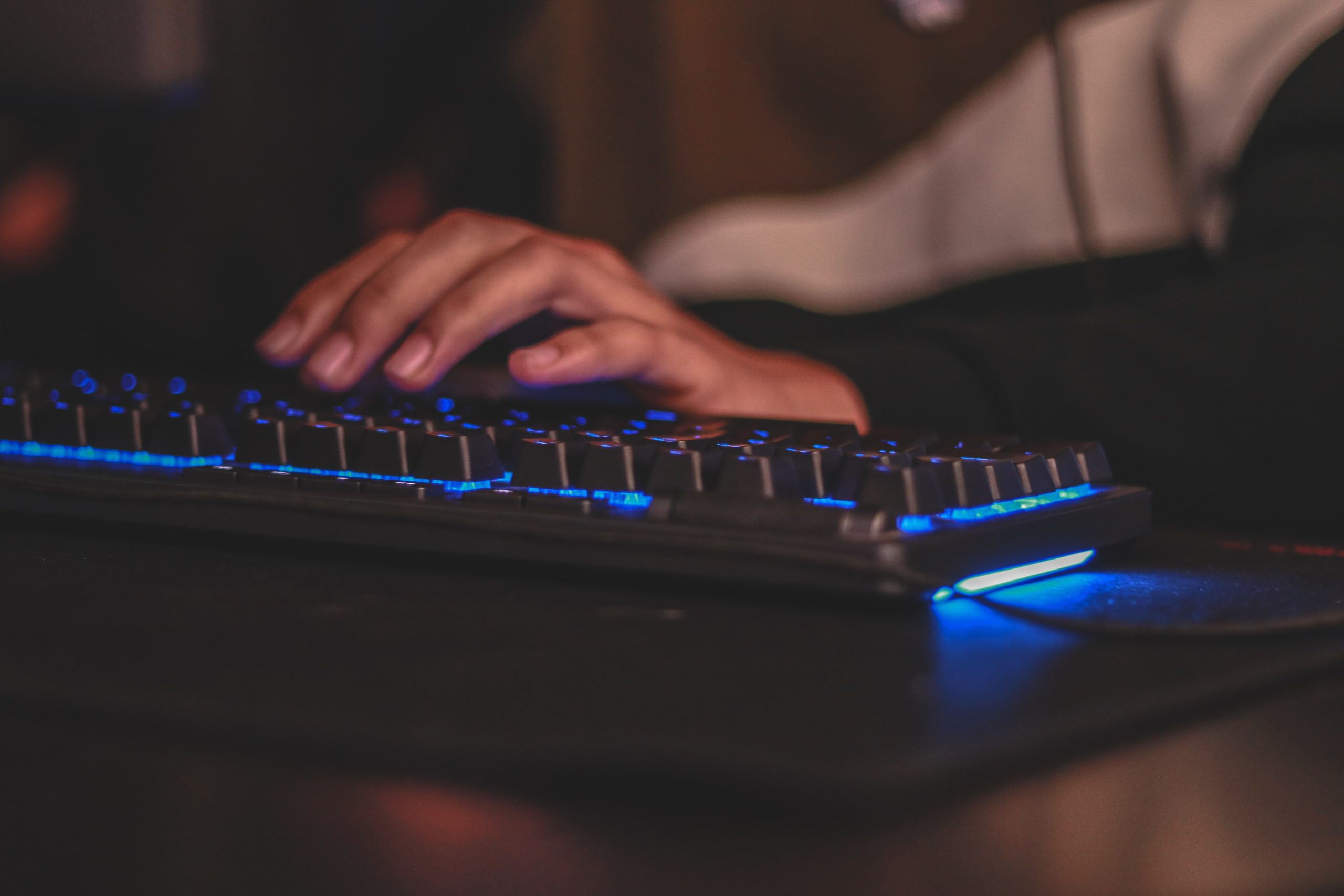 A person at a gaming keyboard.